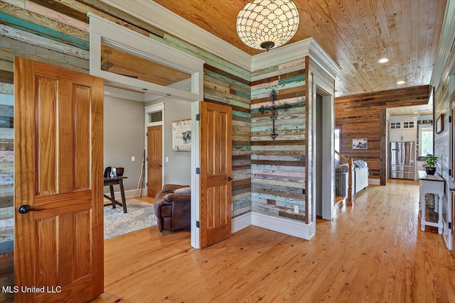 849 Athens Rd, Mendenhall, MS 39114 - corridor featuring wooden ceiling, light wood-style flooring, ornamental molding, and wooden walls