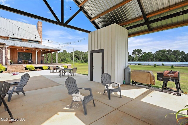 849 Athens Rd, Mendenhall, MS 39114 - view of patio featuring grilling area, outdoor dining area, a gazebo, and an outbuilding