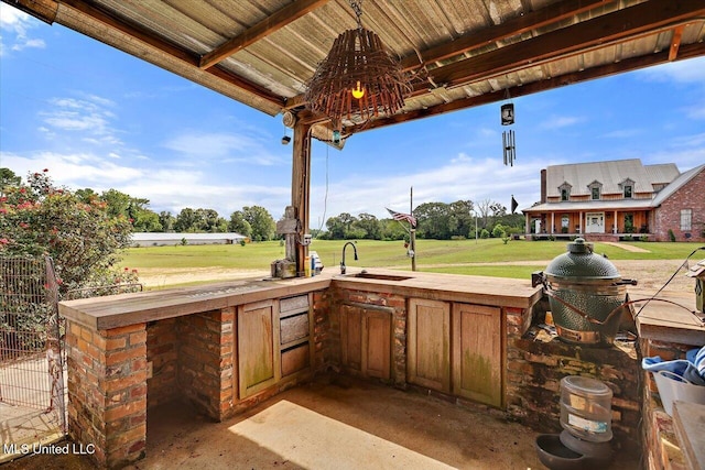 849 Athens Rd, Mendenhall, MS 39114 - view of patio / terrace featuring exterior kitchen and a sink