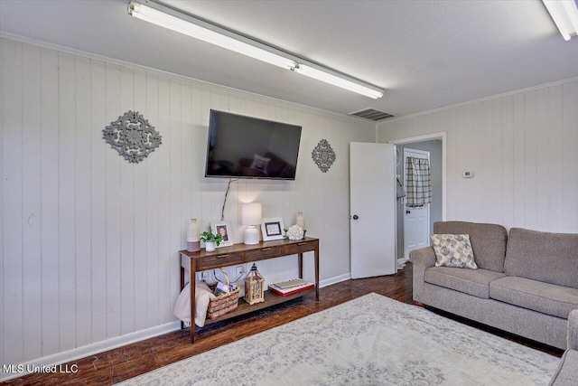 849 Athens Rd, Mendenhall, MS 39114 - living area featuring dark wood-style floors and wood walls