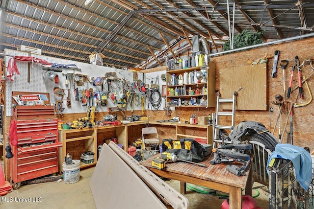 849 Athens Rd, Mendenhall, MS 39114 - misc room with a workshop area, lofted ceiling, and concrete floors