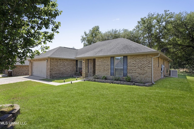 ranch-style home featuring a garage and a front lawn