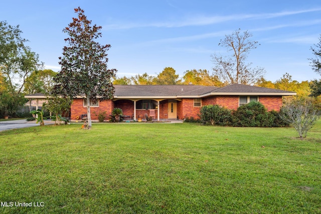 ranch-style home with a front yard