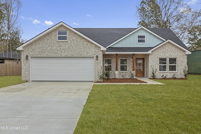 view of front facade featuring a garage and a front yard