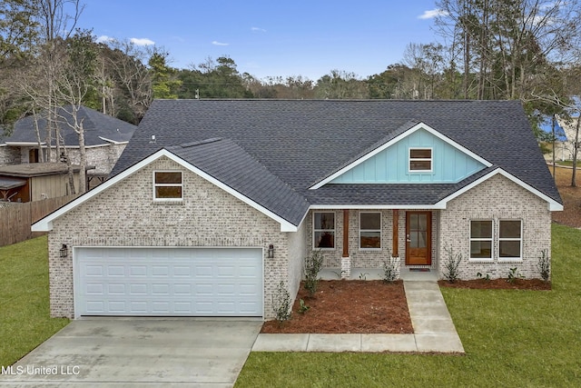 view of front facade with a garage and a front yard