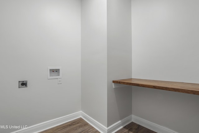 washroom featuring electric dryer hookup, hookup for a washing machine, and dark hardwood / wood-style flooring