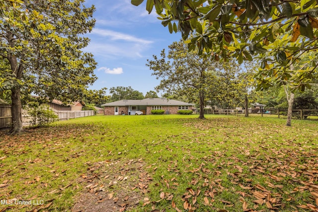 view of yard featuring fence