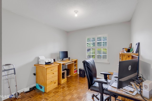 home office featuring baseboards