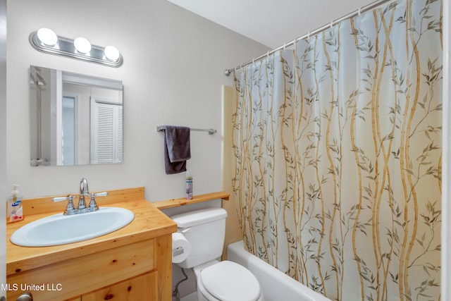 full bathroom with toilet, shower / tub combo, and vanity