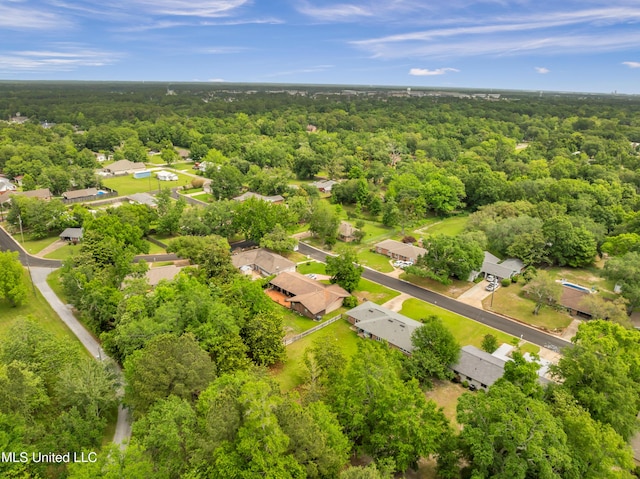 bird's eye view with a view of trees and a residential view
