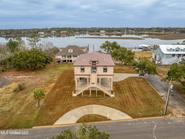 drone / aerial view with a water view