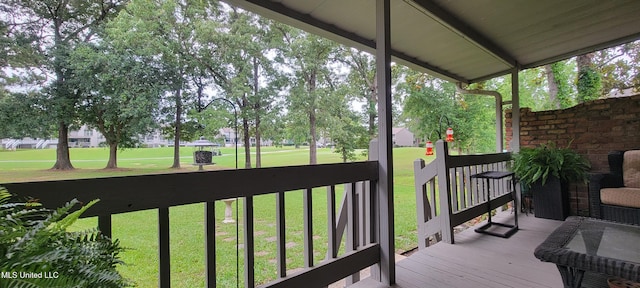417 Highpoint Dr, Diamondhead, MS 39525 - wooden deck with a lawn