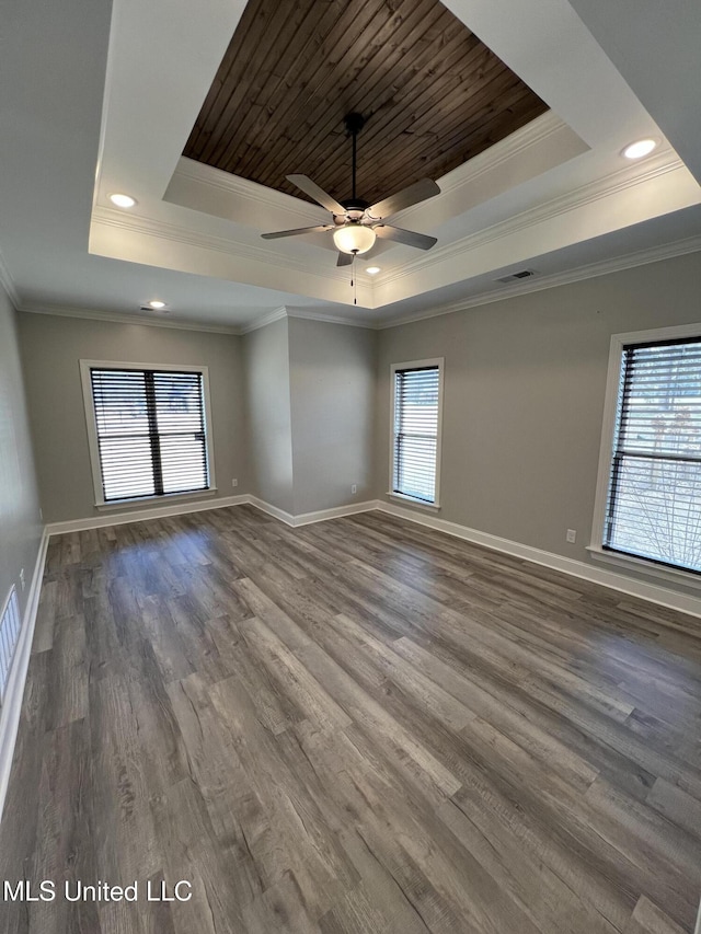 11368 Cedar Point Cv, Hernando, MS 38632 - unfurnished room featuring a tray ceiling, crown molding, ceiling fan, baseboards, and wood finished floors