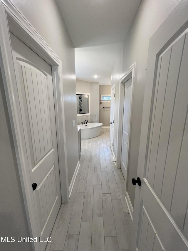 11368 Cedar Point Cv, Hernando, MS 38632 - hall with wood finished floors and baseboards