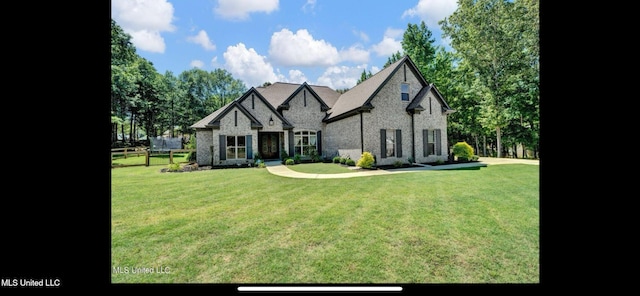 11368 Cedar Point Cv, Hernando, MS 38632 - french country style house featuring a front lawn