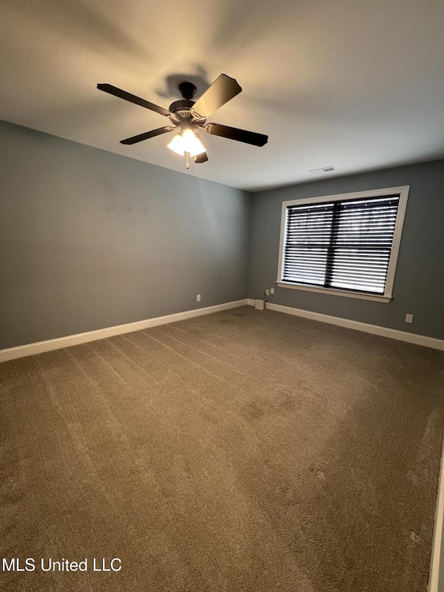 11368 Cedar Point Cv, Hernando, MS 38632 - empty room with carpet flooring, a ceiling fan, and baseboards