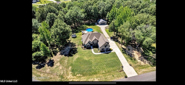 11368 Cedar Point Cv, Hernando, MS 38632 - aerial view of property and surrounding area featuring a heavily wooded area