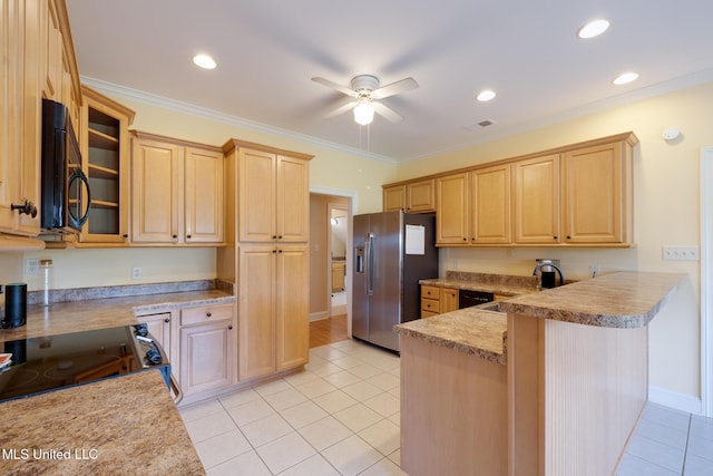 475 Wilburn Rd, Michigan City, MS 38647 - kitchen with stainless steel fridge, black microwave, light brown cabinetry, light tile patterned floors, and recessed lighting