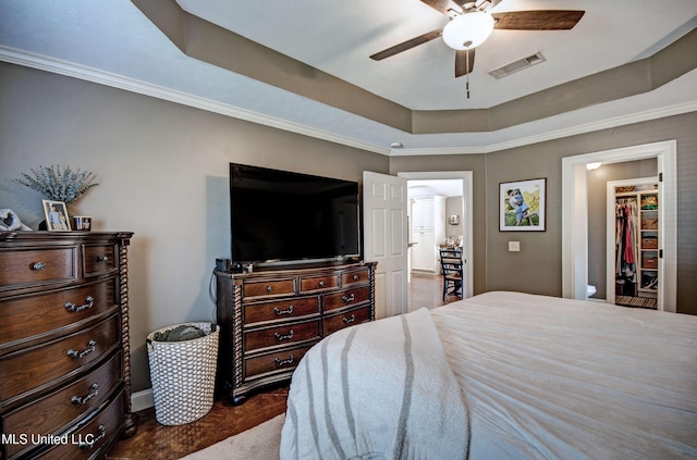 862 Willow Grande Cir, Brandon, MS 39047 - bedroom with a raised ceiling, ceiling fan, and ornamental molding