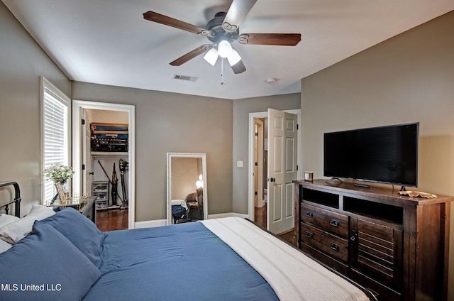 862 Willow Grande Cir, Brandon, MS 39047 - bedroom with baseboards, ceiling fan, and wood finished floors