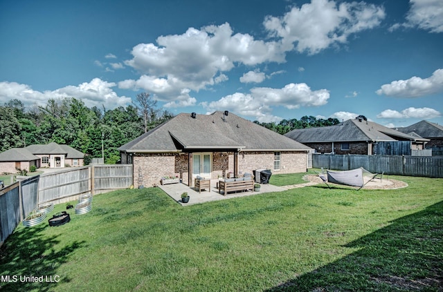 862 Willow Grande Cir, Brandon, MS 39047 - rear view of property featuring outdoor lounge area, brick siding, a patio, and roof with shingles