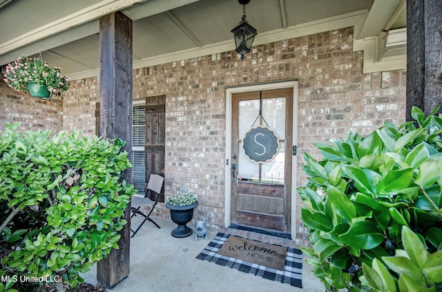862 Willow Grande Cir, Brandon, MS 39047 - doorway to property with brick siding and covered porch