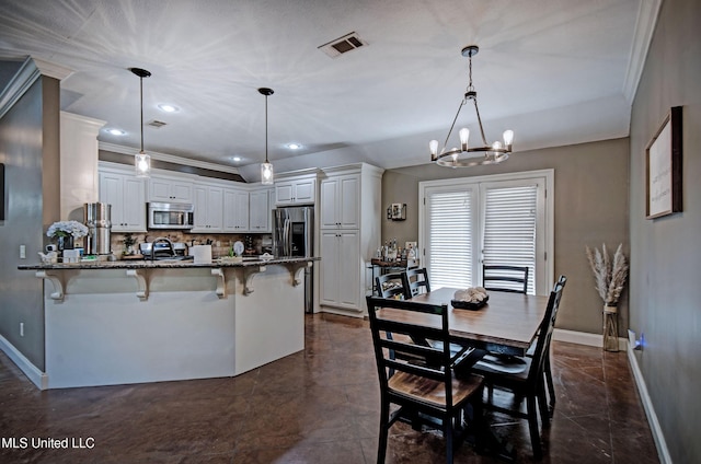 862 Willow Grande Cir, Brandon, MS 39047 - dining room with a chandelier, baseboards, and crown molding