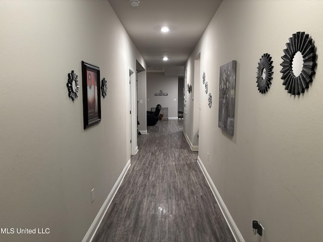 10645 Chapelwood Dr, Gulfport, MS 39503 - corridor featuring baseboards and dark wood-type flooring
