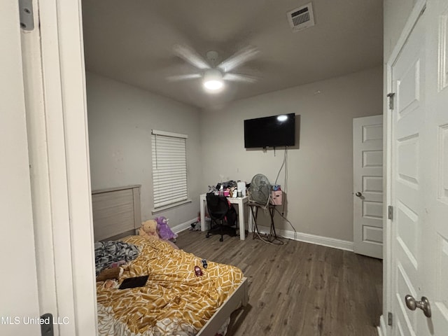 10645 Chapelwood Dr, Gulfport, MS 39503 - bedroom with visible vents, a ceiling fan, baseboards, and wood finished floors