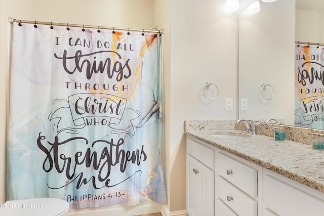 full bath featuring shower / bath combination with curtain, vanity, and toilet