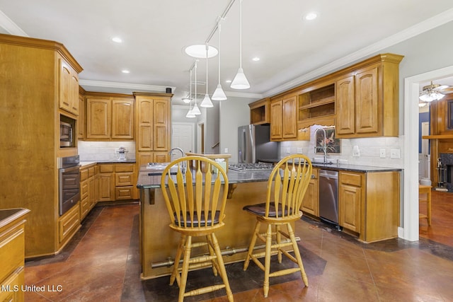 114 Sandstone Dr, Brandon, MS 39047 - kitchen featuring appliances with stainless steel finishes, crown molding, open shelves, tasteful backsplash, and a center island with sink