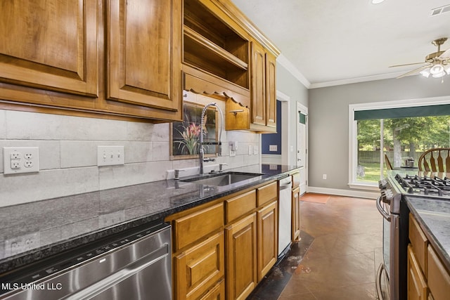 114 Sandstone Dr, Brandon, MS 39047 - kitchen featuring appliances with stainless steel finishes, crown molding, a sink, ceiling fan, and tasteful backsplash