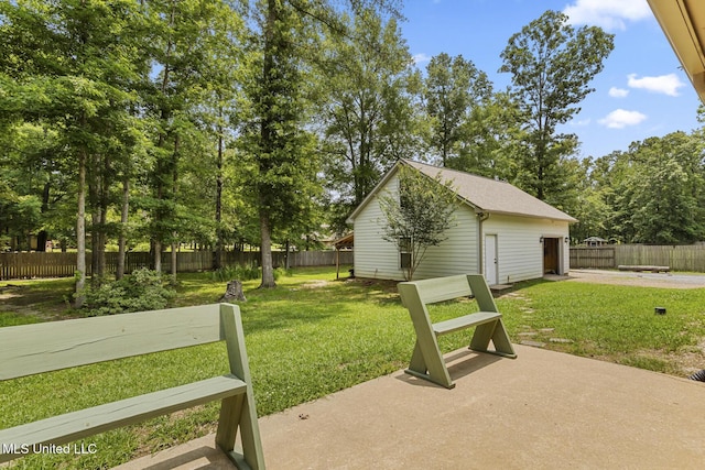 114 Sandstone Dr, Brandon, MS 39047 - view of yard featuring a patio area, an outdoor structure, and a detached garage