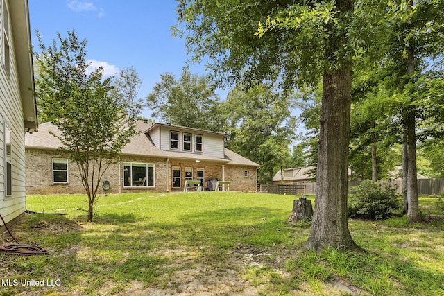114 Sandstone Dr, Brandon, MS 39047 - rear view of property with brick siding and roof with shingles