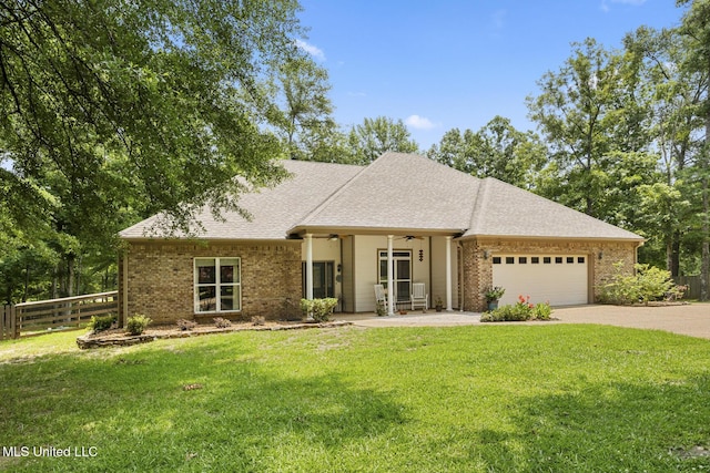 114 Sandstone Dr, Brandon, MS 39047 - view of front facade with driveway, a garage, brick siding, and a ceiling fan