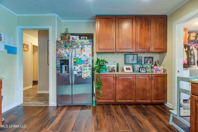 kitchen with ornamental molding, light stone countertops, dark wood-type flooring, and stainless steel fridge with ice dispenser