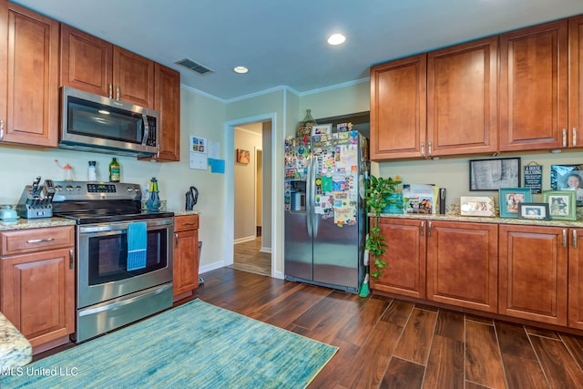 kitchen with crown molding, stainless steel appliances, light stone countertops, and dark hardwood / wood-style floors