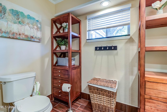 bathroom featuring toilet