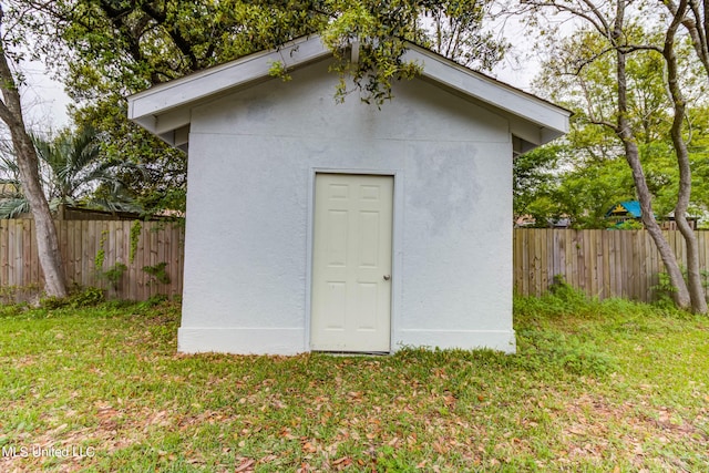 view of outdoor structure featuring a yard