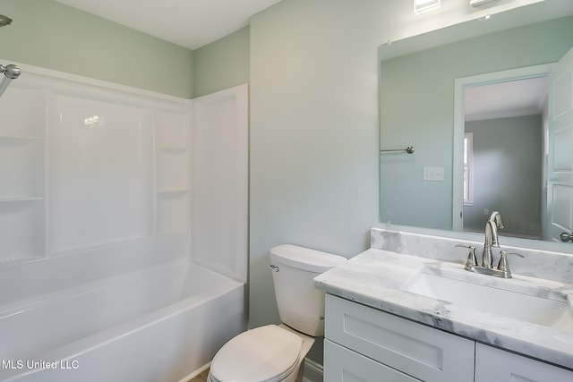 full bathroom with shower / bathing tub combination, vanity, and toilet