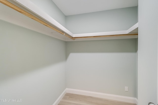 walk in closet featuring light wood-type flooring