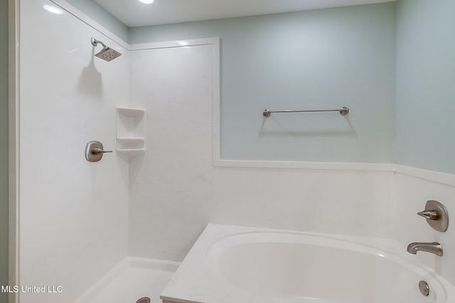 bathroom with a washtub