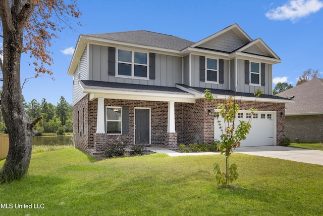 craftsman inspired home with a garage and a front lawn