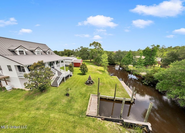 11020 Jordan Dr, Bay Saint Louis, MS 39520 - aerial view of property and surrounding area featuring a large body of water and a tree filled landscape
