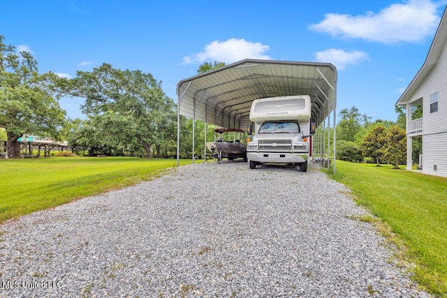 11020 Jordan Dr, Bay Saint Louis, MS 39520 - view of car parking with a detached carport and driveway