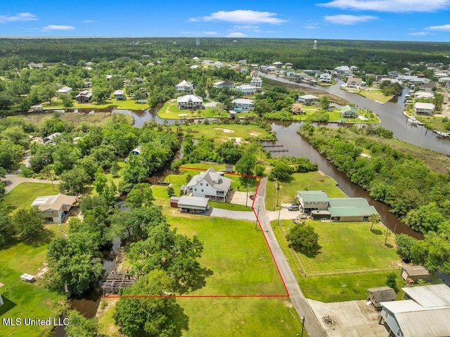 11020 Jordan Dr, Bay Saint Louis, MS 39520 - aerial perspective of suburban area featuring a nearby body of water and property parcel outlined