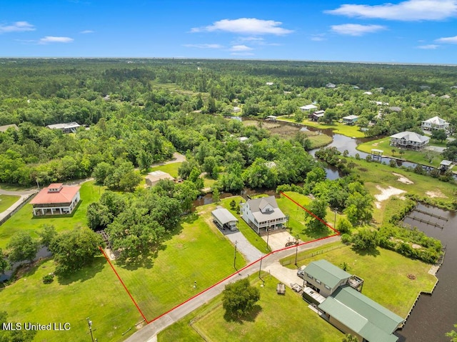 11020 Jordan Dr, Bay Saint Louis, MS 39520 - aerial overview of property's location featuring a heavily wooded area, property boundaries highlighted, and a nearby body of water