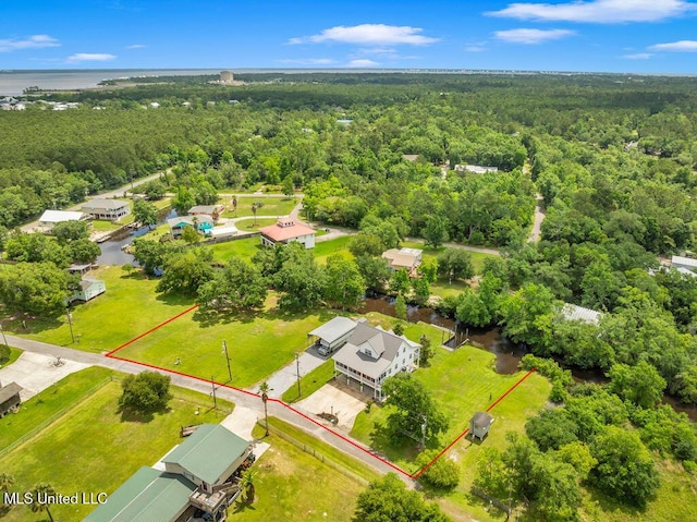 11020 Jordan Dr, Bay Saint Louis, MS 39520 - aerial view of property's location featuring a heavily wooded area and property boundaries highlighted