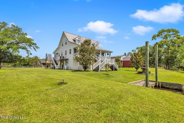 11020 Jordan Dr, Bay Saint Louis, MS 39520 - view of grassy yard with stairway