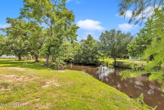 11020 Jordan Dr, Bay Saint Louis, MS 39520 - view of grassy yard with a water view